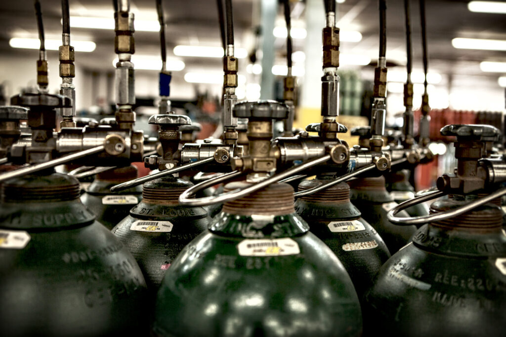 welding gas cylinders stacked for refilling