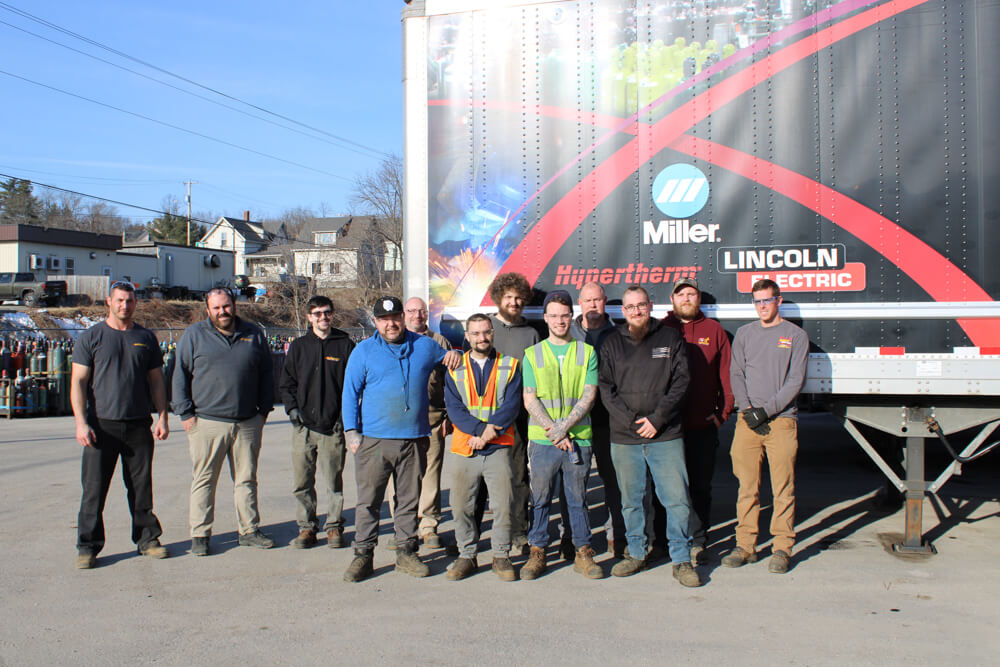 maine oxy team members standing together